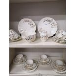 Victorian scottish thistle scene tea set with two plates.