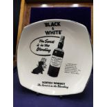 Black & White scotch whisky advertising plate.