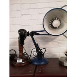 Vintage telephone together with angle poiste light.