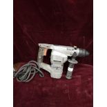 Baucker large power drill.