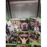 Shelf of xbox 360 games.