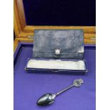 Vintage leather purse with silver Hall marked clip together with 1939 white metal Canadian spoon.