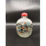 Large Oriental glass perfume bottle depicting samurai warriors.