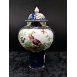 Booth and sons blue background temple jar depicting panel painted birds.