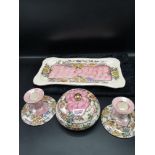 Maling pink thumb print dressing table set.