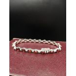 Silver hall marked Bracelet set with oval garnet stones.