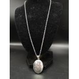 Vintage Silver hall marked locket on a 19 inch silver belcher link chain . 14.6 grams .