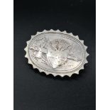 Silver unhallmarked brooch set in scottish design.