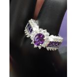 Silver 925 Bling Ring set With purple & white stones.