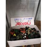 Box of vintage action figures.
