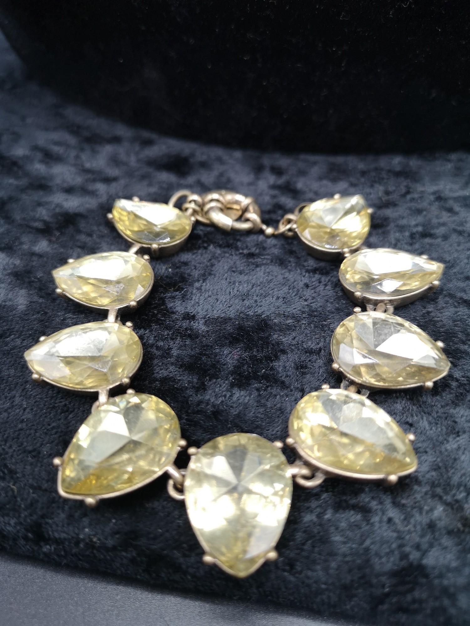 Yellow stones large pear shapes antique setting bracelet.