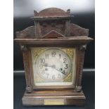 Antique victorian mantle clock with presentation plaque to front.