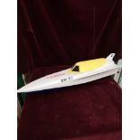 Large racing boat model with motor.