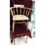 Antique captains arm chair.