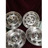 Set of 4 vintage jaguar wheel hubs.