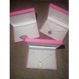 3 necklaces with presentation boxes.