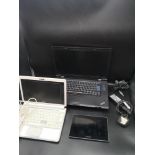 2 laptops together with blackberry tablet.