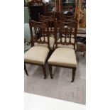 Set of 4 antique 19th century chairs with caster feet.