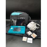 Nintendo 3ds with bag and charger together with nintendo ds games includes Mario kart.