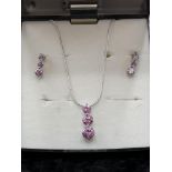 Silver 925 Italy necklace set with matching earrings set in pink stones.