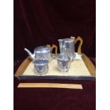 5 piece piquot ware tes set includes tray.