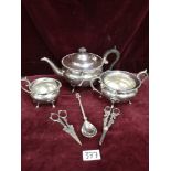 3 piece silver plated quality tea set together with 2 sets of 1900s grape fruit scissor s and
