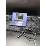 Nintendo ds with USB charger.