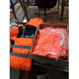 High viz boiler suit size large together with box of hi fiz trousers size 36 waists.