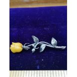 Silver vintage floral brooch with carved baltic amber rose stamped 925 .