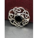 Celtic Silver 925 infinity brooch set in black.