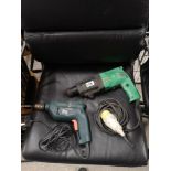 Hitachi 110 volt drill together with black n decker drill.