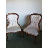 Pair of Reproduction button back chairs in really good condition.