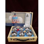 Set of French Boules in fitted box.