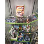 Shelf of xbox 360 games.