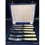 Set of 6 silver Hall marked collard knifes with ivorine handles in fitted case.