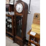 Art deco Oak cased grand father clock with pendulum and weights.