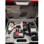 Boxed cordless drill with charger etc.