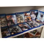 Shelf of PlayStation 4 games.