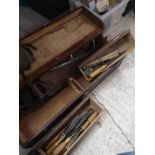 Vintage carpenters tool box containing tools .