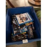 Box of dvds and blue rays .