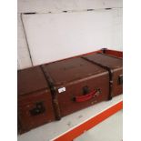 Vintage wooden bound travel trunk.