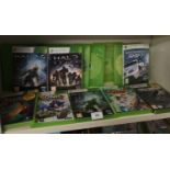 Shelf of xbox 360 games.