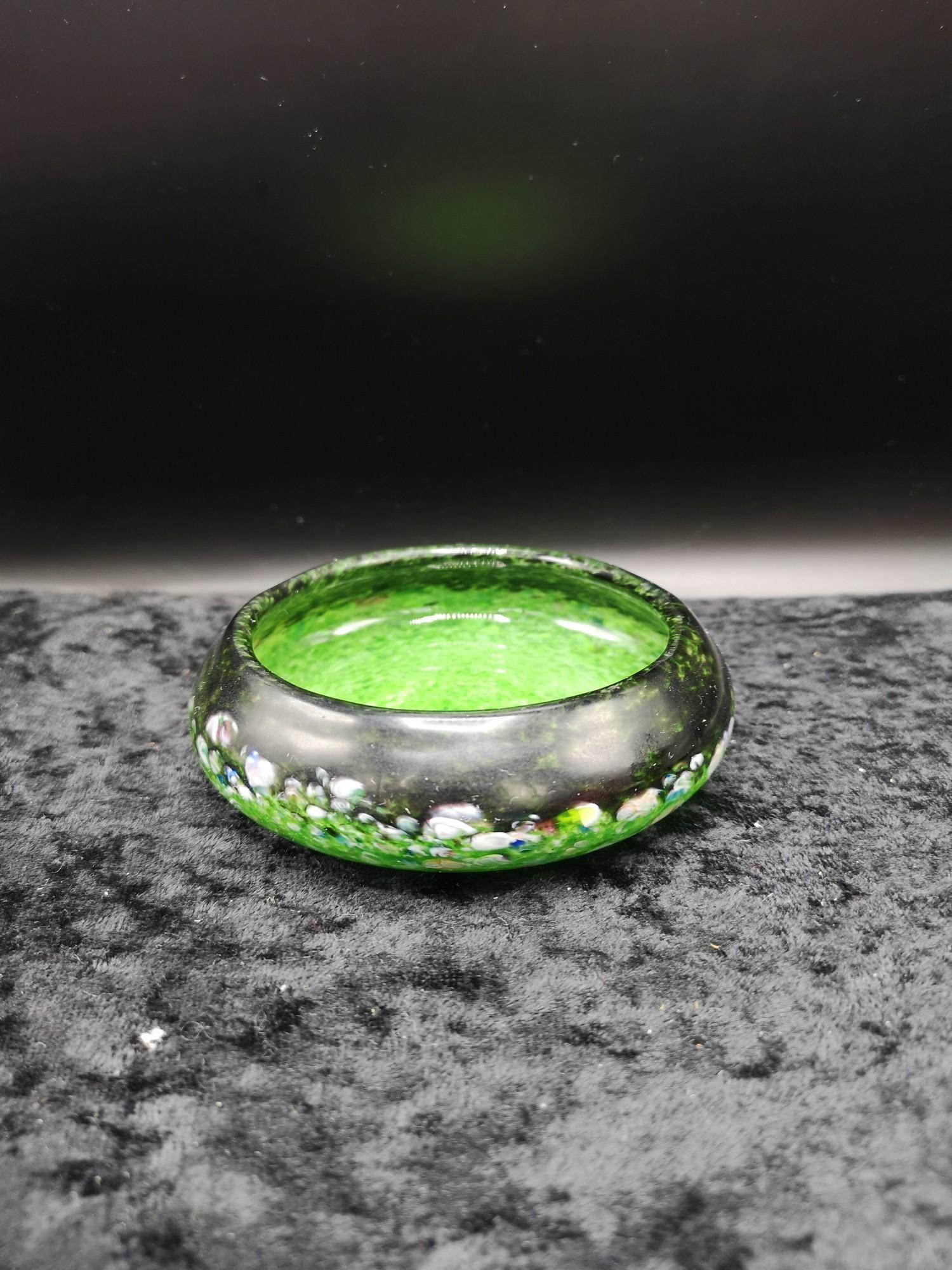 Scottish glass Monart bowl set in green and black with multiple colours.