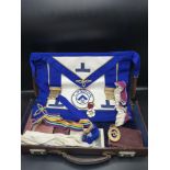 Masonic apron set with medal and jewel in fitted leather casing.