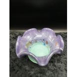 Scottish glass Strathearn bowl set in green and purple with multiple swirls.