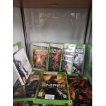 Shelf of xbox 360 games.