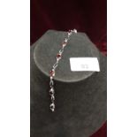 Silver Bracelet Set With Oval Garnet Stones. 7.5 inches 7g