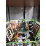 Shelf of xbox 360 games.