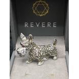 White metal scottie dog brooch set with stones.