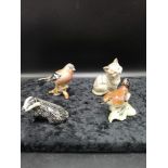 2 Beswick bird figures, Beswick badger together with royal doulton cat figure..